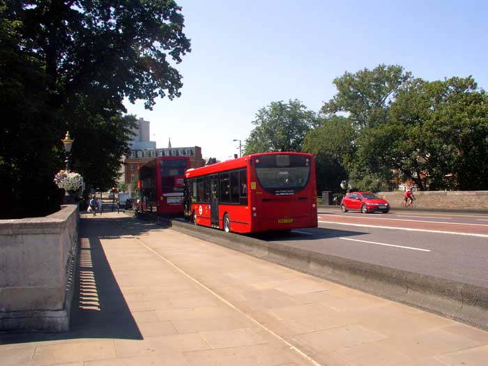 Two buses cross Kingston Bridge